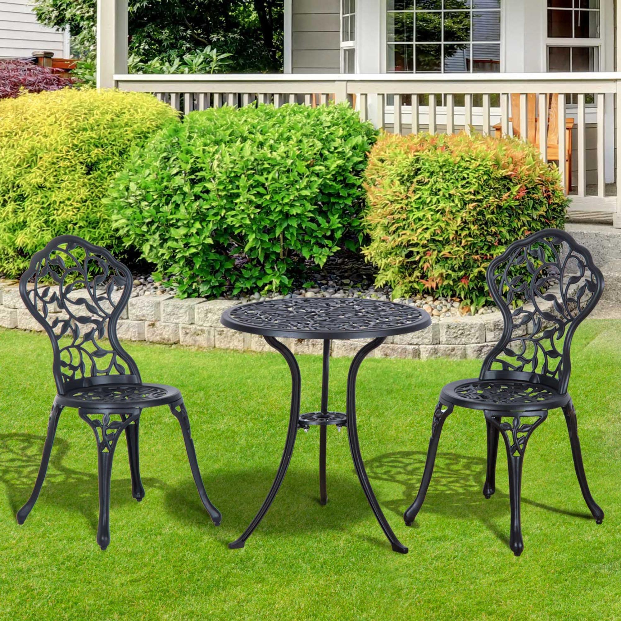 black cast iron table and chairs