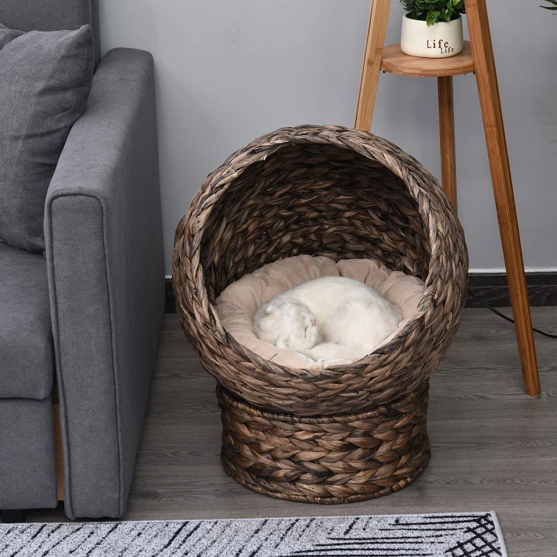 PawHut Handwoven Elevated Cat Bed with Rotating Basket and Soft Cushion, Wicker Cat Egg Chair with Stand, Brown