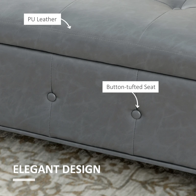 HOMCOM Storage Ottoman Bench with Soft Closing Hinged Lid, Faux Leather Upholstered Bench with Button Tufted Design and Armrests for Living Room, Gray