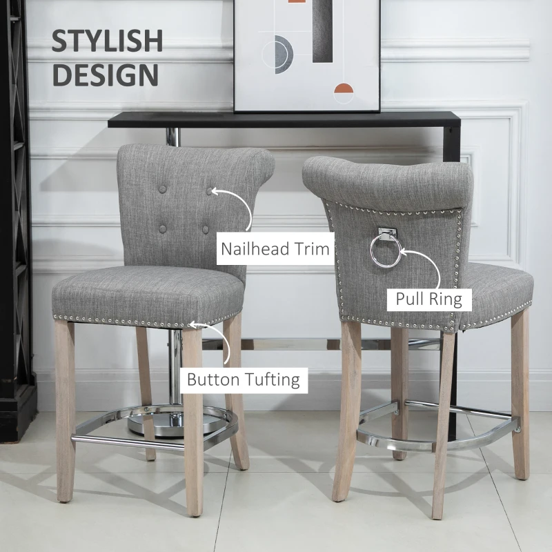 HOMCOM 26"Counter Height Bar Stools Set of 2, Linen Upholstered Tufted Dining Chairs with Steel Footrest, and Solid Wood Legs, Grey