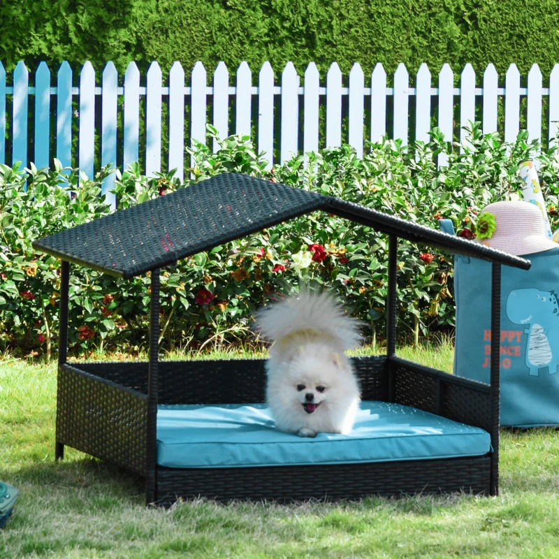 PawHut Wicker Dog House Outdoor with Canopy, Rattan Dog Bed with Water-resistant Cushion, Raised Pet Bed for Small, Medium Breeds up to 66 lbs, 20" in Length, Brown Wicker, Blue Cushion