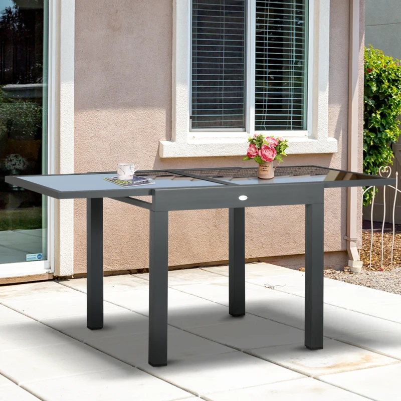 Outsunny 63" Extendable Outdoor Dining Table Patio Table with Aluminum Frame and Tempered Glass Tabletop, Black