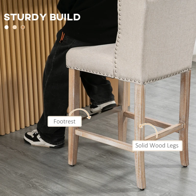 HOMCOM Counter Height Bar Stools Set of 2, 27" Seat Height Upholstered Barstools, Farmhouse Kitchen Island Stools with Nailhead-Trim, Tufted Back and Wooden Legs, Beige