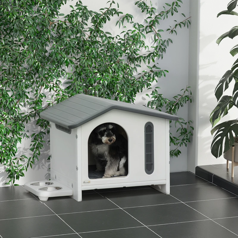 PawHut Plastic Dog House with Air Vents, Small Dog House with Door Opening, Elevated Floor, Bowl Holder, 2 Bowls, Soft Washable Cushion, for Small Sized Dogs, White