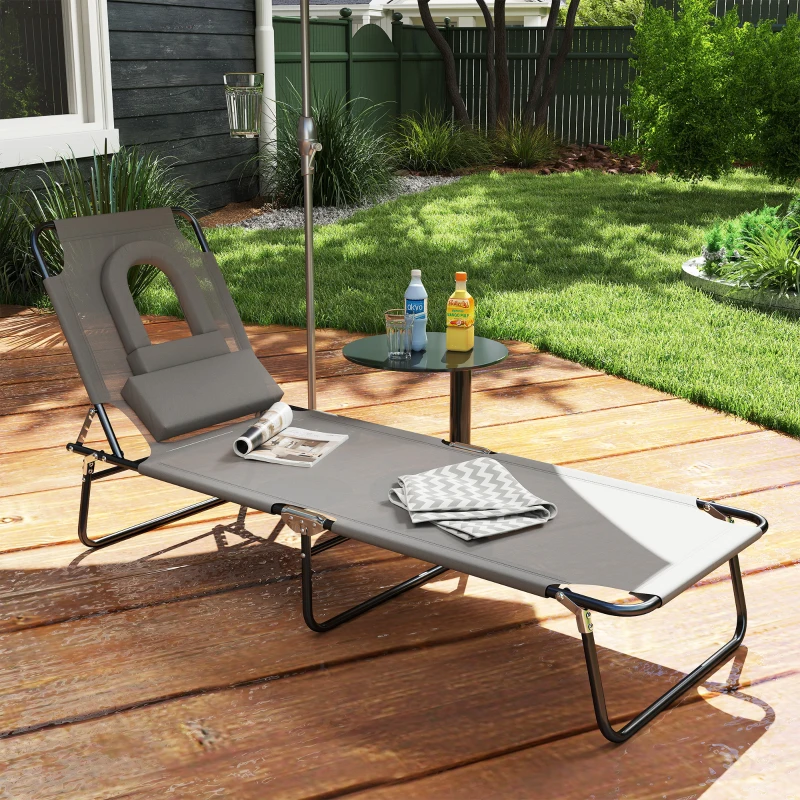 Outsunny Adjustable Outdoor Lounge Chair, Garden Folding Chaise Lounge with Face Hole Reclining Tanning Chair Seat, Folding Camping Beach Lounging Bed w/ Support Pillow, Grey