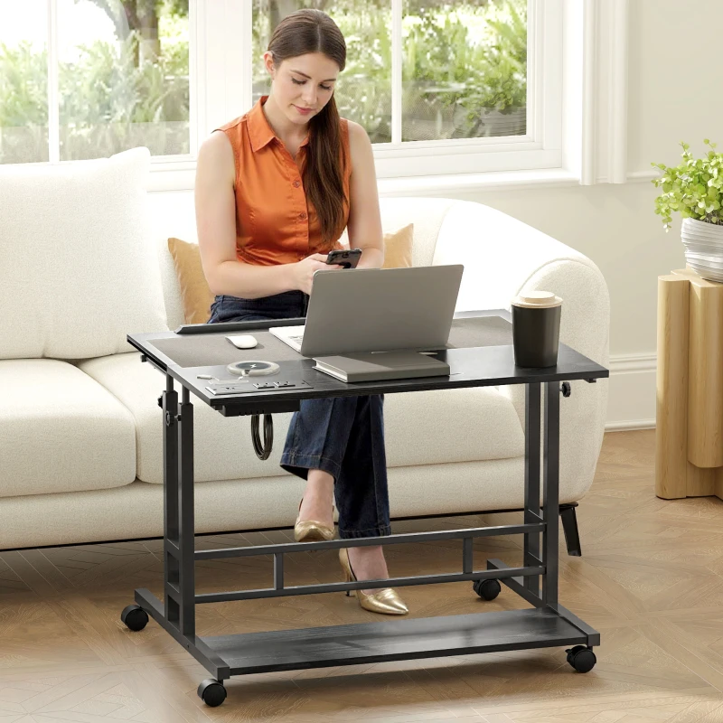 HOMCOM Adjustable Standing Desk with Power Outlets, Stand Up Desk with Tiltable Tabletop, Wheels, Shelf, for Home Office, Black
