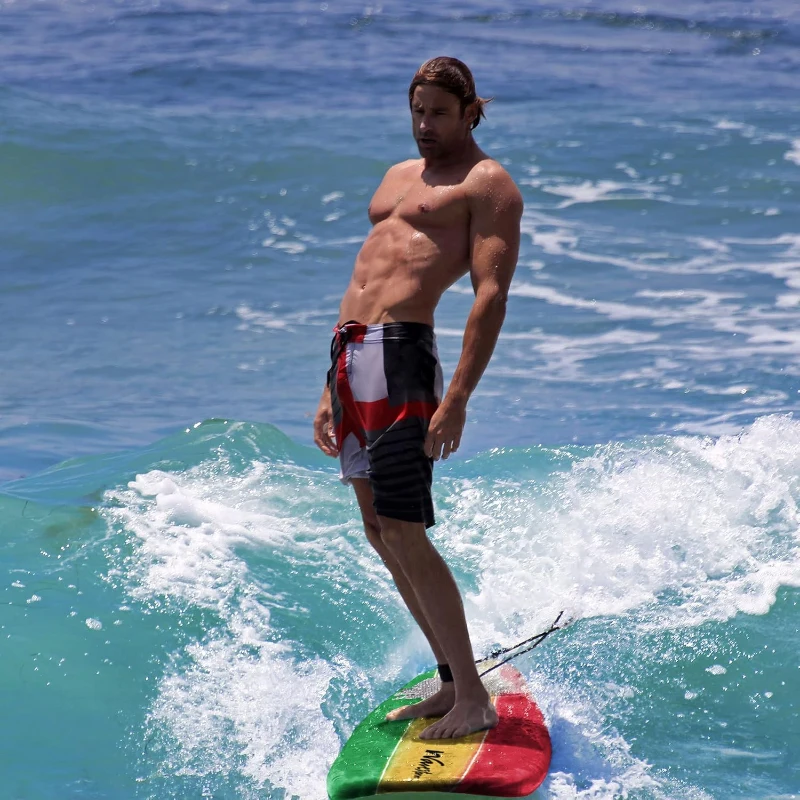 Wavestorm 8' Classic Soft-Top Surfboard with Rasta Graphic