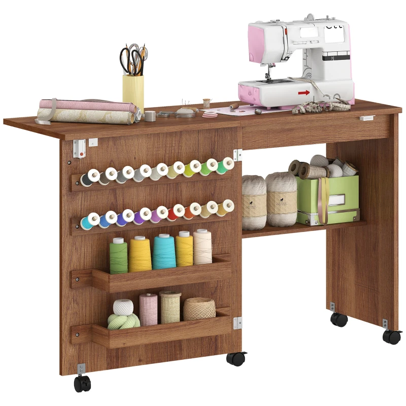 HOMCOM Sewing Machine Table on Wheels, Folding Craft Table with 2 Bins, Storage Shelf, 18 Pegs, Lockable Wheels, Brown