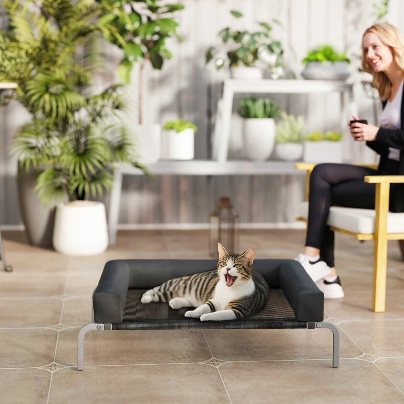 PawHut Elevated Dog Bed, Portable Raised Dog Cot with Breathable Mesh, Removable and Water-Resistant Bolsters, Black