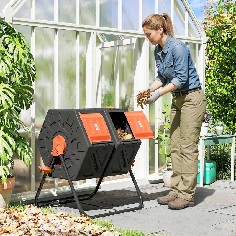 Outsunny Rotating Composter, Dual Chamber Compost Bin with 24 Vents and Steel Legs, 34.5 Gallon, Orange