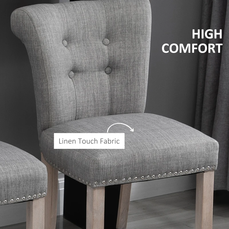 HOMCOM 26"Counter Height Bar Stools Set of 2, Linen Upholstered Tufted Dining Chairs with Steel Footrest, and Solid Wood Legs, Grey