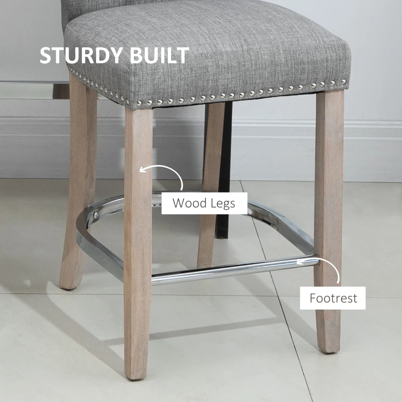 HOMCOM 26"Counter Height Bar Stools Set of 2, Linen Upholstered Tufted Dining Chairs with Steel Footrest, and Solid Wood Legs, Grey