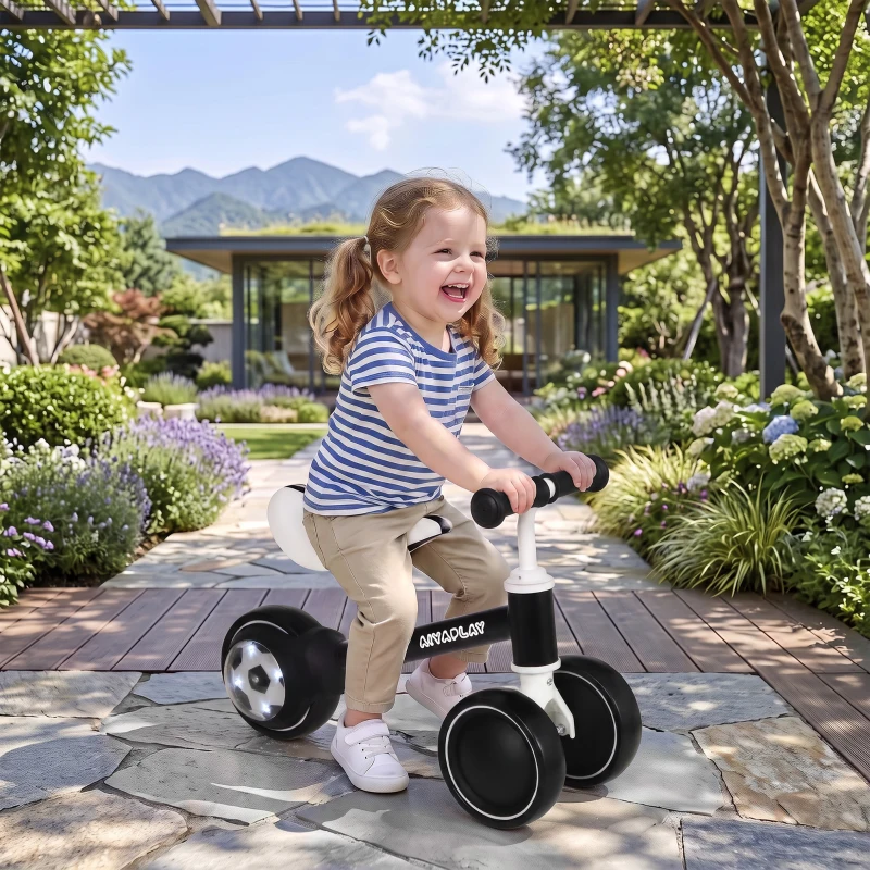 Qaba Balance Bike, Baby Bike with 135° Steering Limit & Lighting Rear Wheels for Toddlers 12-24 Months, Black