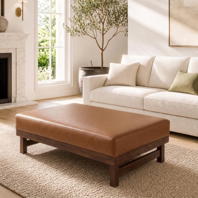 Sleek Large Ottoman with Faux Leather and Walnut Legs, Versatile Coffee Table for Living Room, 48" L × 27.5" W × 15.5" H, Light Brown