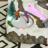 HOMCOM Christmas Village, Rotating Skating Pond Animated Winter Wonderland Set with Multicolored LED Light, Music, Fiber Optic, Battery-Operated Christmas Decoration(m-15)