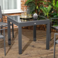 Outsunny 63" Extendable Outdoor Dining Table Patio Table with Aluminum Frame and Tempered Glass Tabletop, Black(m-7)