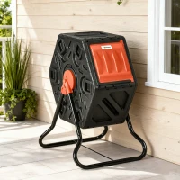 Outsunny Rotating Composter, Compost Bin with 24 Vents and Steel Legs, 17 Gallon, Orange(m-9)
