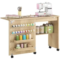 HOMCOM Sewing Machine Table on Wheels, Folding Craft Table with 2 Bins, Storage Shelf, 18 Pegs, Lockable Wheels, Natural(m-9)