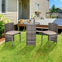 Outsunny 3 PCS Outdoor Rattan Wicker Bistro Set with Storage Shelf, Glass Top Table, Soft Cushioned Chairs and Space Saving Design, Patio Conversation Set for Garden Backyard Porch, Grey(m-10)