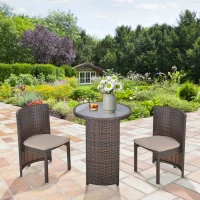 Outsunny 3 PCS Outdoor Rattan Wicker Bistro Set with Storage Shelf, Glass Top Table, Soft Cushioned Chairs and Space Saving Design, Patio Conversation Set for Garden Backyard Porch, Brown(m-2)