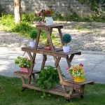 Outsunny 57'' x 14'' x 41'' Wooden 4 Tier Plant Shelf with Wheels Brown